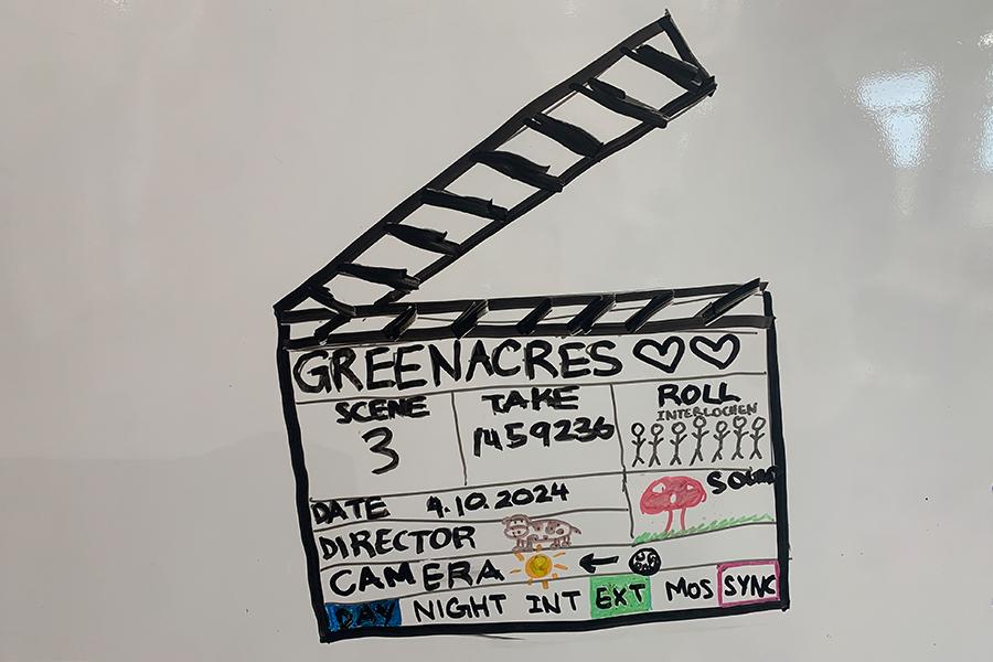 A drawing of a film slate on a whiteboard. 